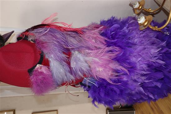 The Magic Flute: Papagenas pink, lilac and purple bodice with matching feather skirt and feathered bird headdress,